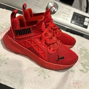 Gently worn Puma red sneakers